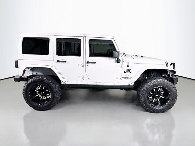 used 2013 Jeep Wrangler Unlimited car, priced at $12,495