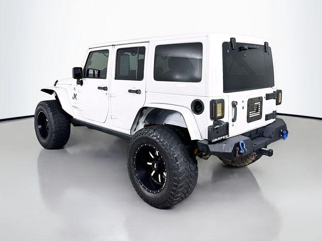 used 2013 Jeep Wrangler Unlimited car, priced at $12,495