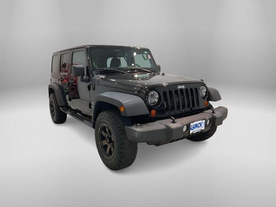 used 2013 Jeep Wrangler Unlimited car, priced at $13,995