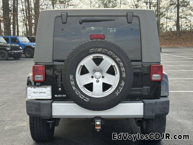 used 2010 Jeep Wrangler Unlimited car, priced at $9,949