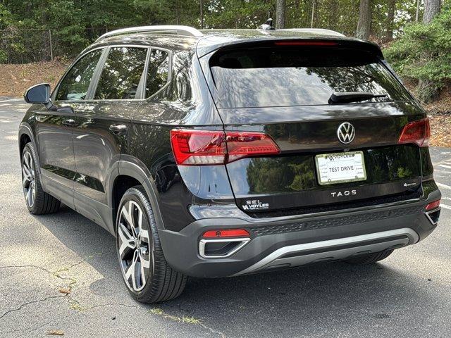 used 2023 Volkswagen Taos car, priced at $25,940