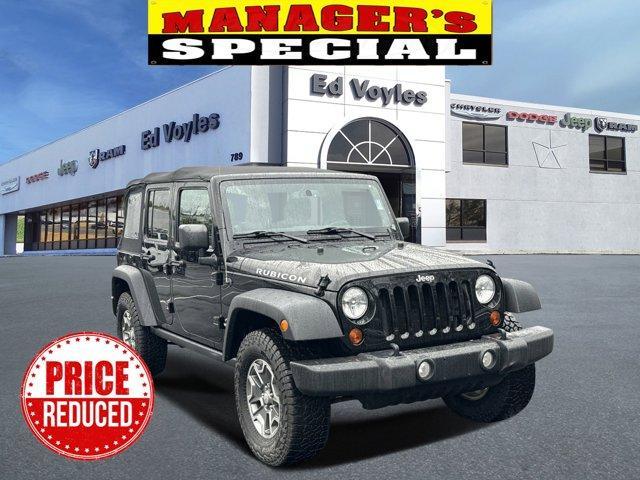 used 2013 Jeep Wrangler Unlimited car, priced at $18,060