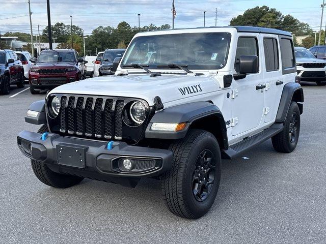 used 2023 Jeep Wrangler 4xe car, priced at $26,630