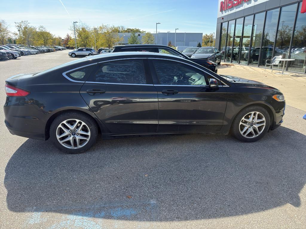 used 2015 Ford Fusion car, priced at $6,389