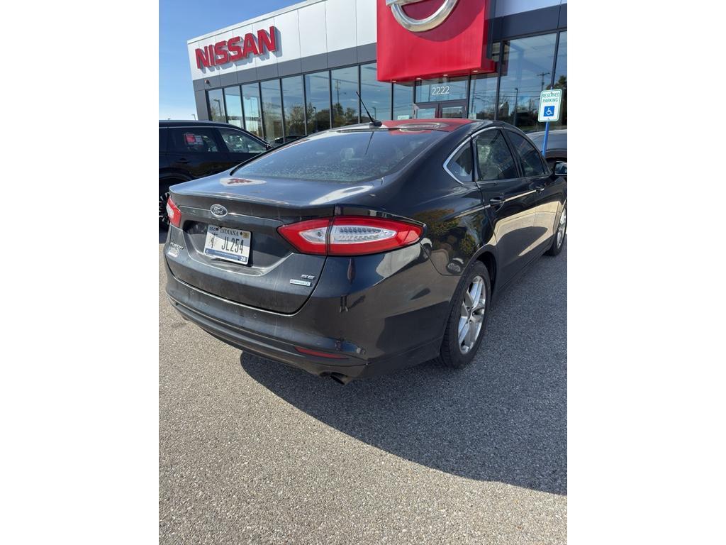 used 2015 Ford Fusion car, priced at $6,389