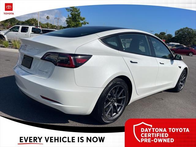used 2022 Tesla Model 3 car, priced at $33,885