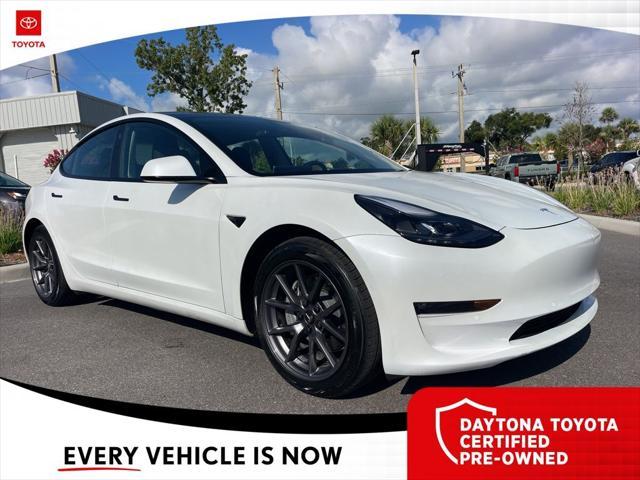 used 2022 Tesla Model 3 car, priced at $33,885