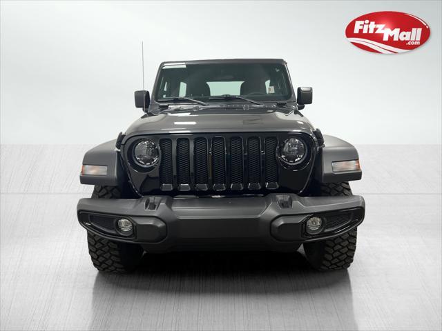 used 2023 Jeep Wrangler car, priced at $35,094