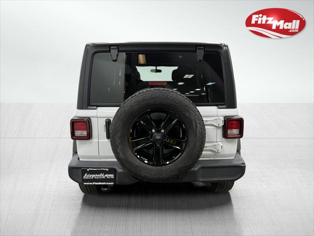 used 2021 Jeep Wrangler Unlimited car, priced at $31,594