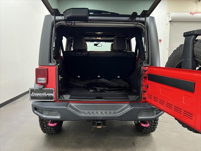 used 2015 Jeep Wrangler Unlimited car, priced at $26,894