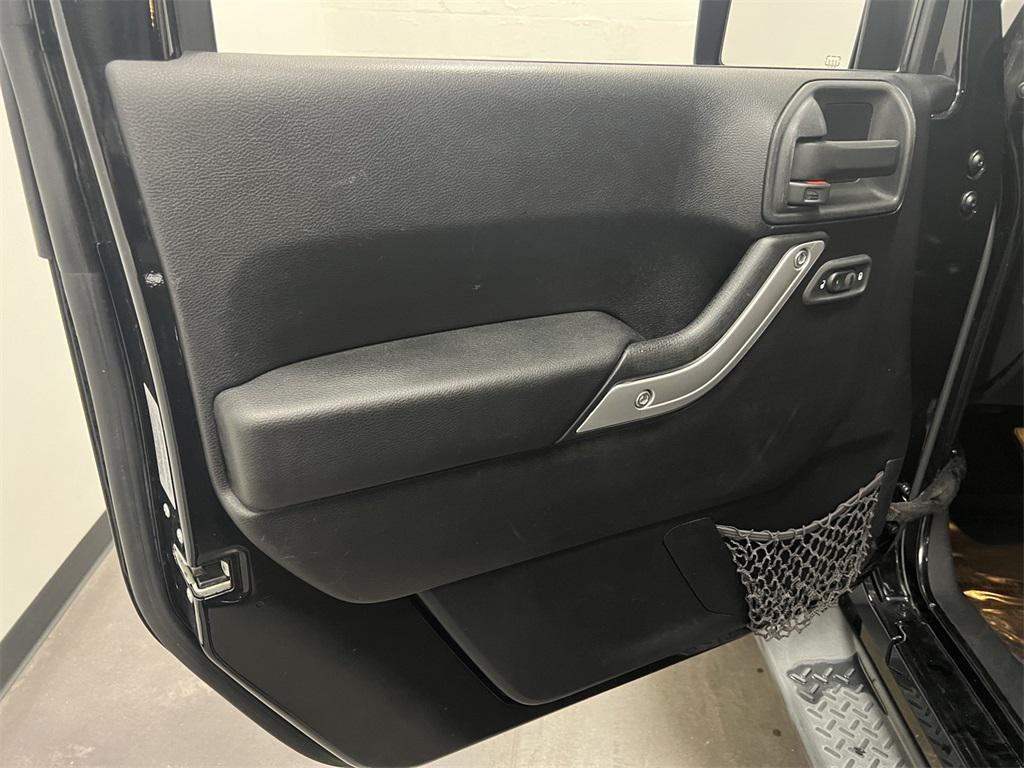 used 2015 Jeep Wrangler Unlimited car, priced at $17,194