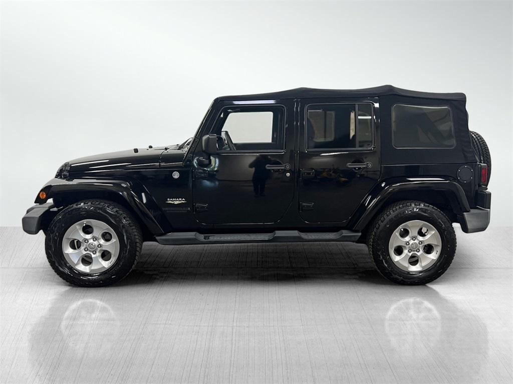 used 2015 Jeep Wrangler Unlimited car, priced at $17,194