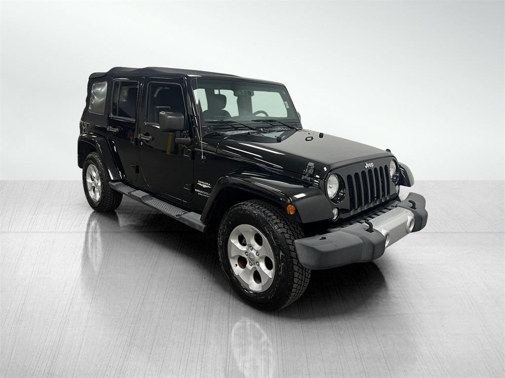 used 2015 Jeep Wrangler Unlimited car, priced at $17,194