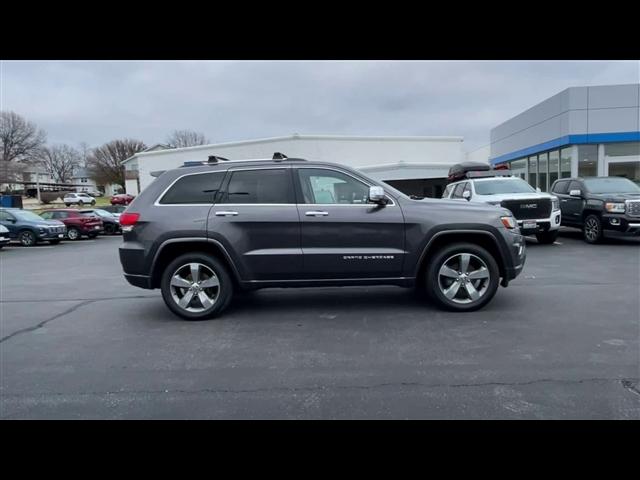 used 2014 Jeep Grand Cherokee car, priced at $13,999