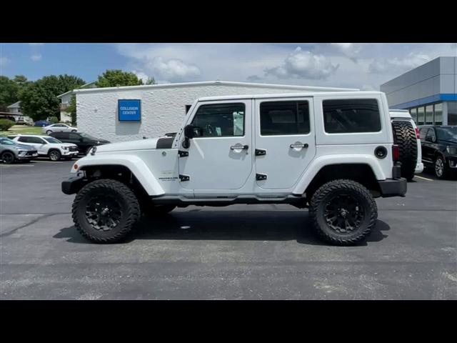 used 2013 Jeep Wrangler Unlimited car, priced at $18,595