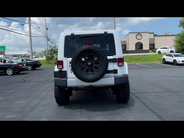 used 2013 Jeep Wrangler Unlimited car, priced at $18,595