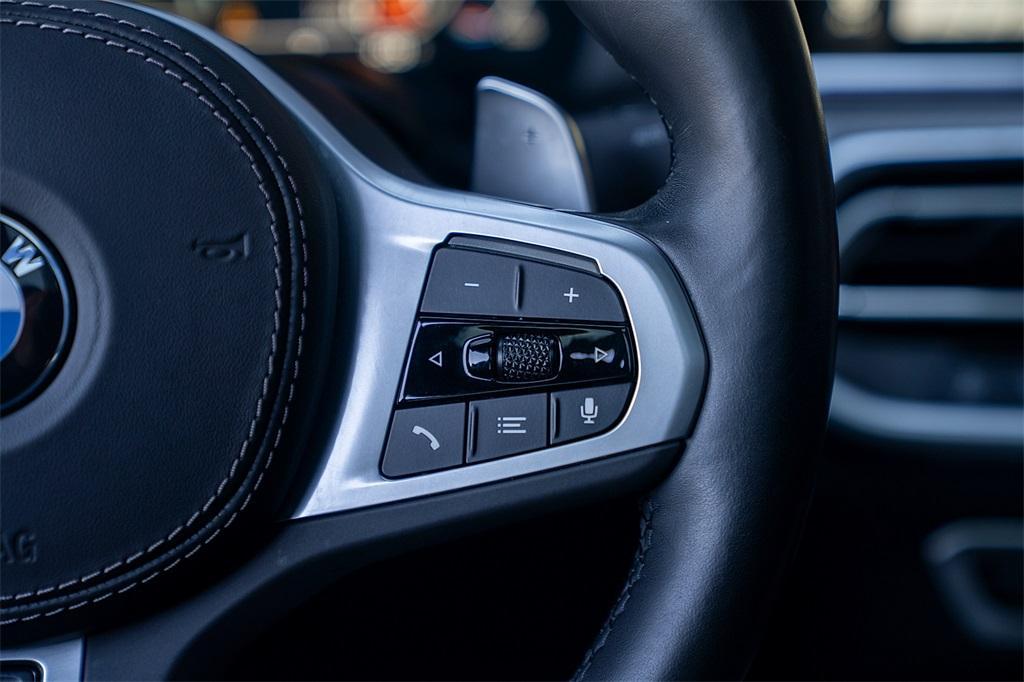used 2023 BMW X6 car, priced at $65,900