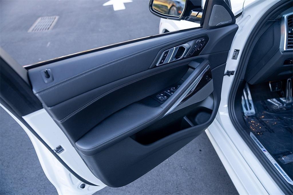 used 2023 BMW X6 car, priced at $65,900