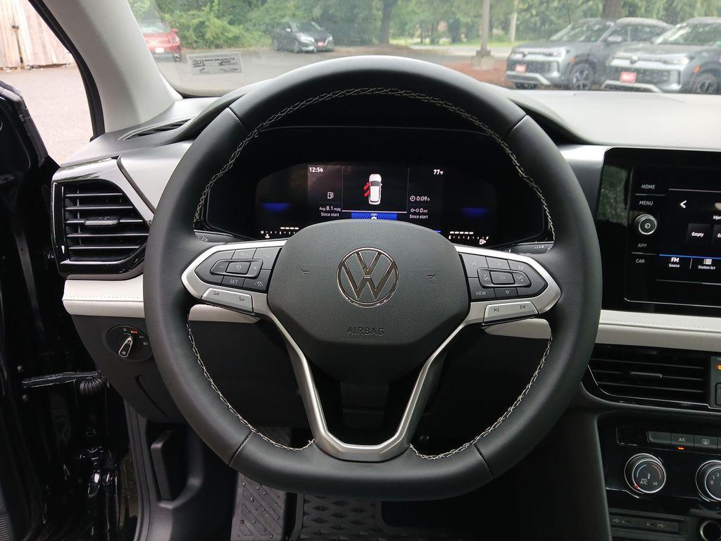 new 2025 Volkswagen Taos car, priced at $26,643