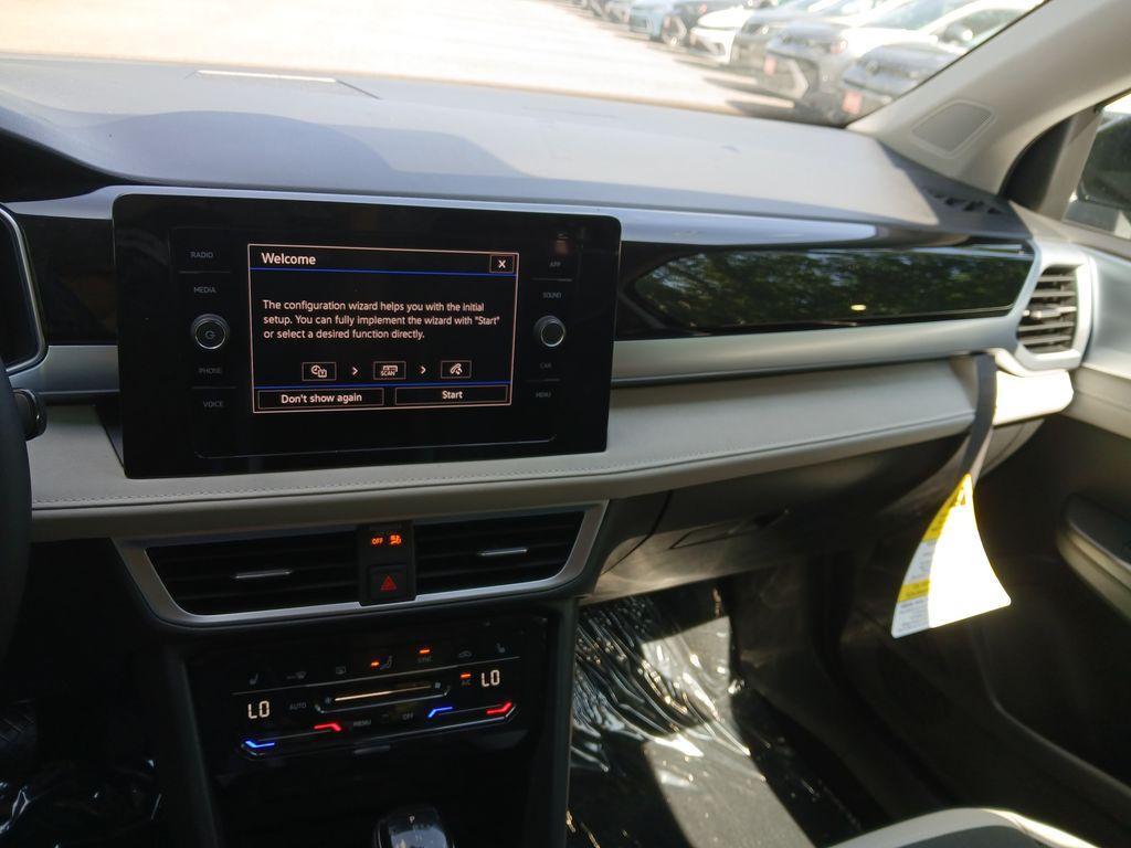 new 2025 Volkswagen Taos car, priced at $25,996