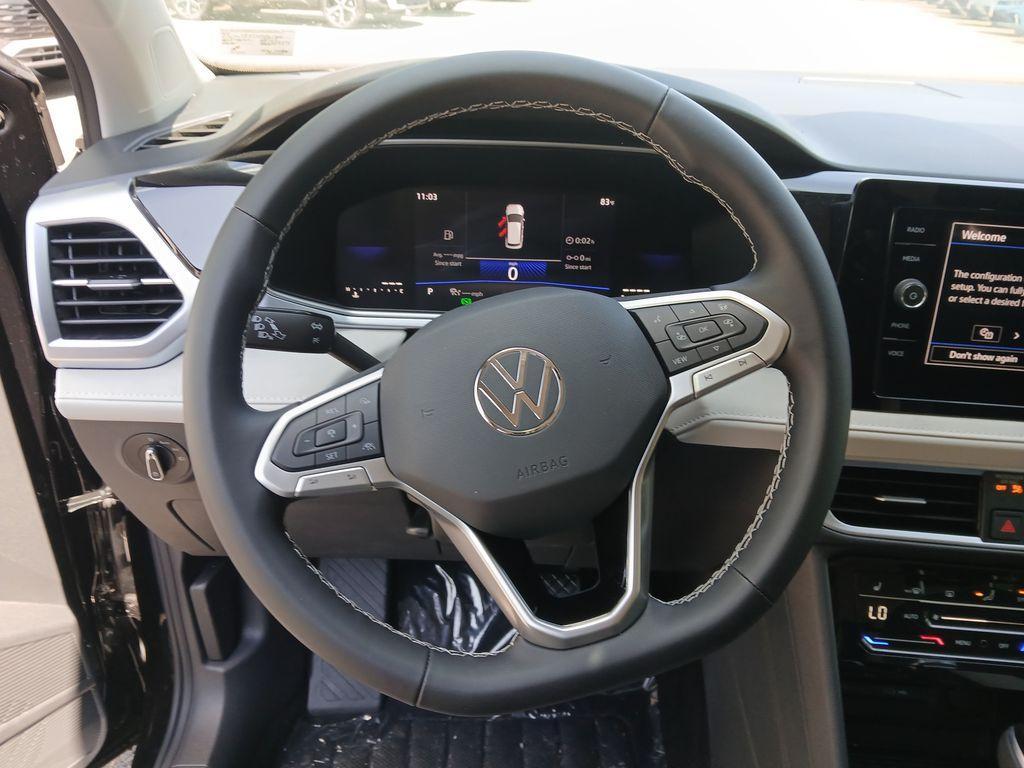 new 2025 Volkswagen Taos car, priced at $25,996