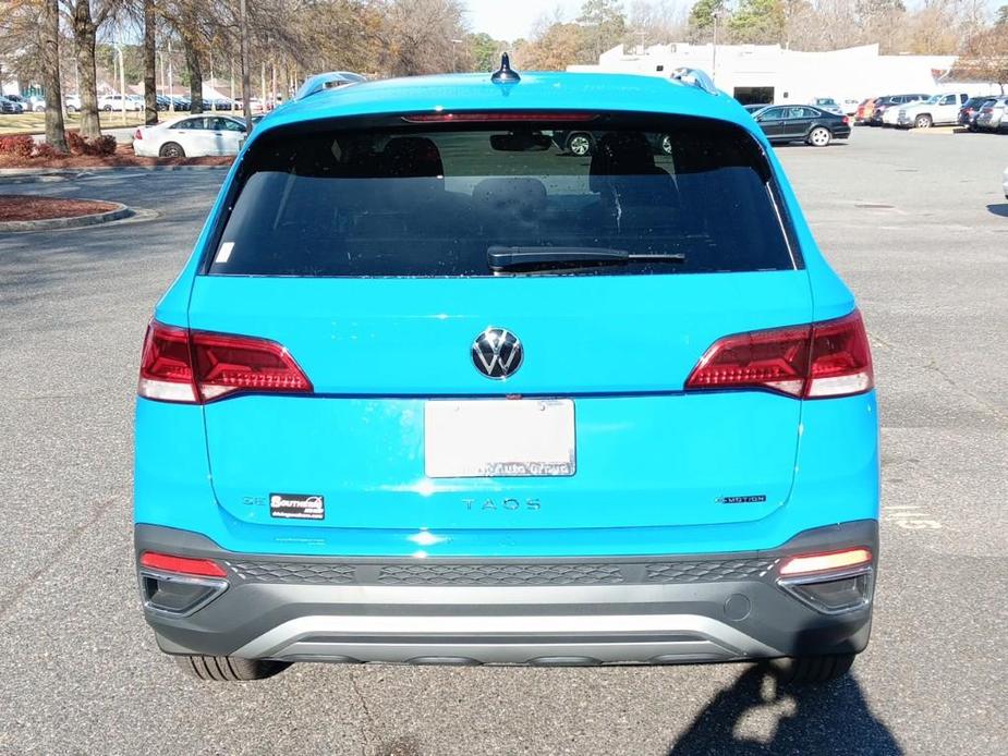 new 2024 Volkswagen Taos car, priced at $29,614