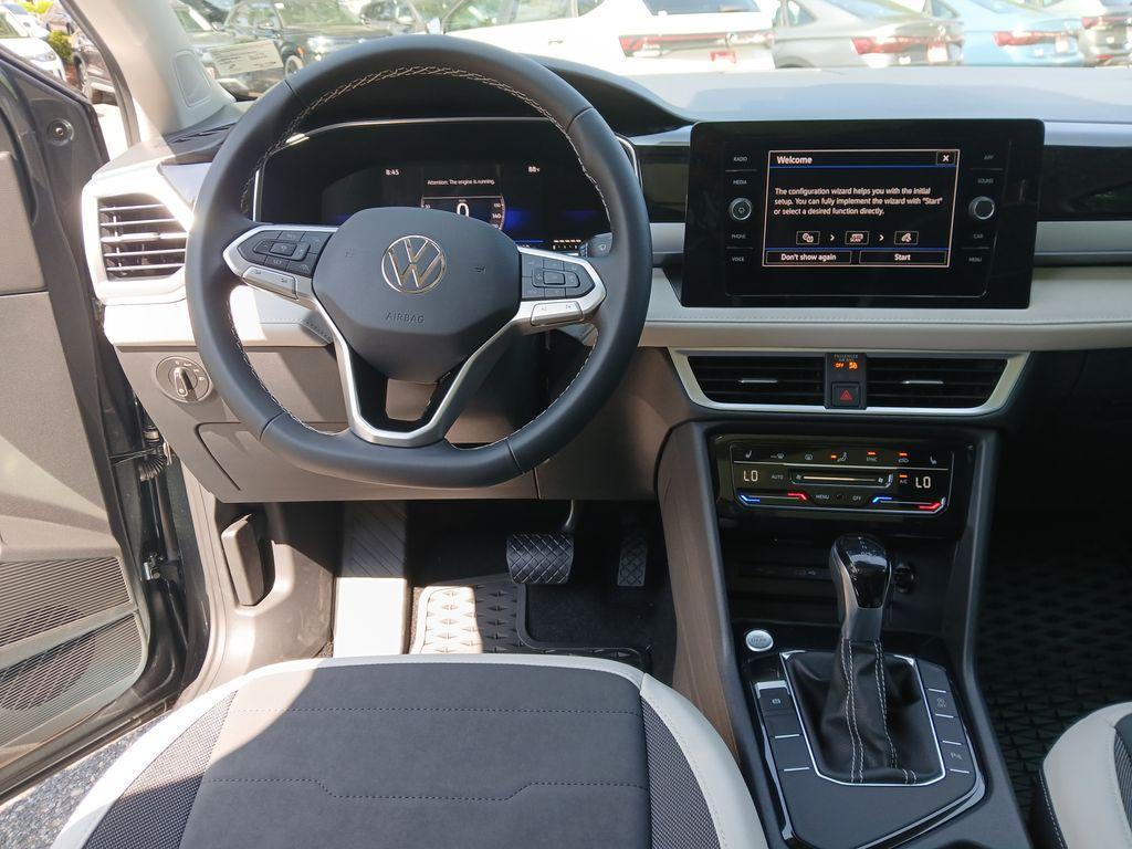 new 2025 Volkswagen Taos car, priced at $27,807