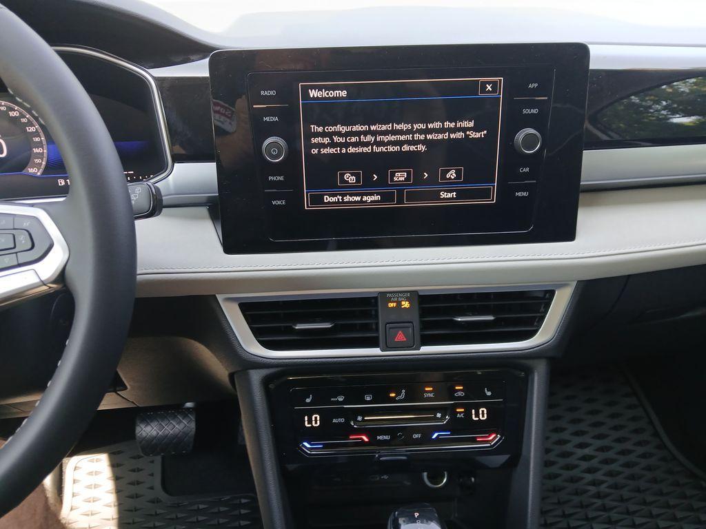 new 2025 Volkswagen Taos car, priced at $27,807