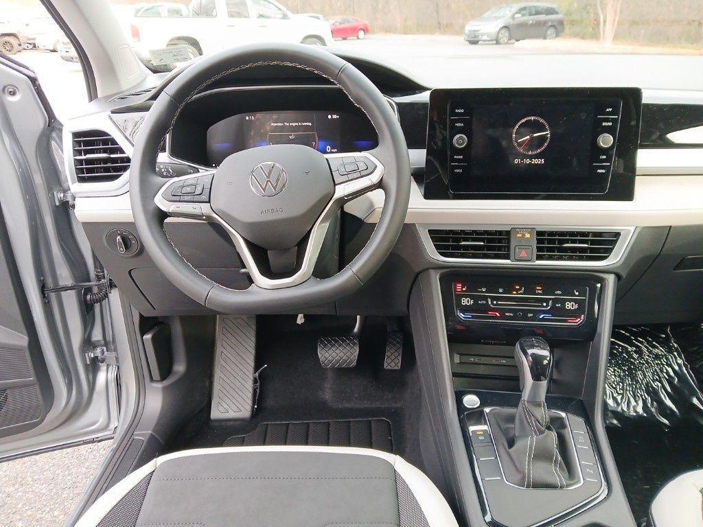new 2025 Volkswagen Taos car, priced at $28,291