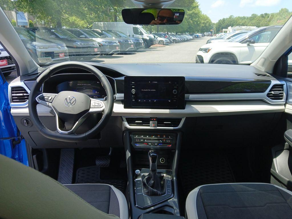 new 2025 Volkswagen Taos car, priced at $31,100