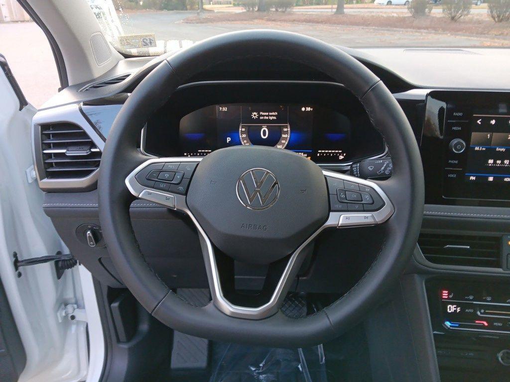 new 2025 Volkswagen Taos car, priced at $30,500