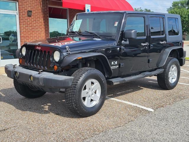 used 2009 Jeep Wrangler Unlimited car, priced at $13,418