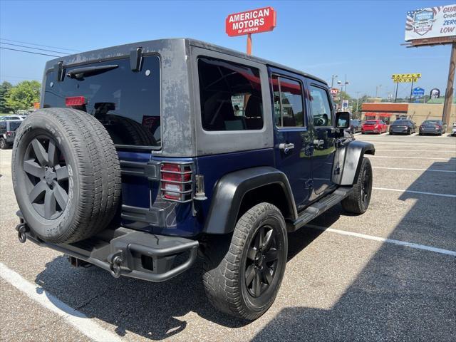 used 2013 Jeep Wrangler Unlimited car, priced at $19,657