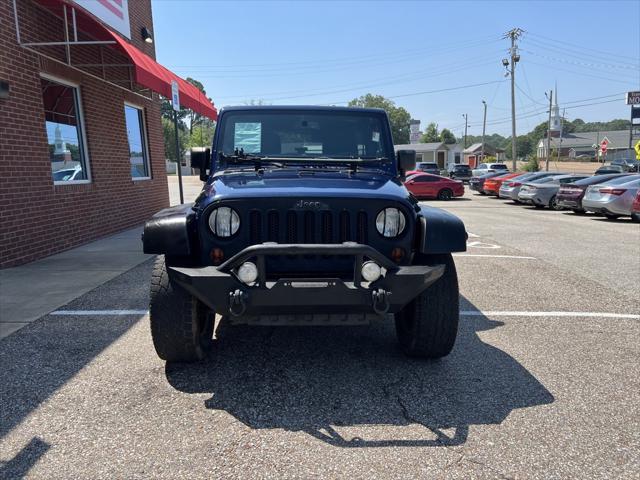 used 2013 Jeep Wrangler Unlimited car, priced at $19,657