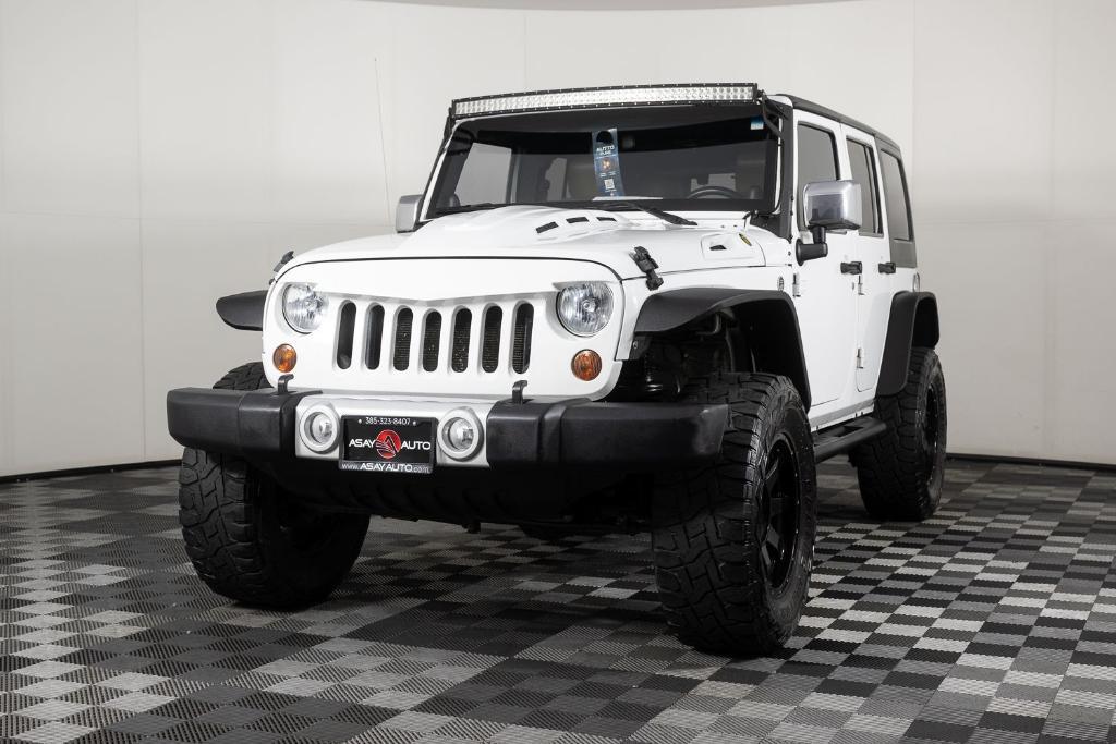 used 2011 Jeep Wrangler Unlimited car, priced at $15,995