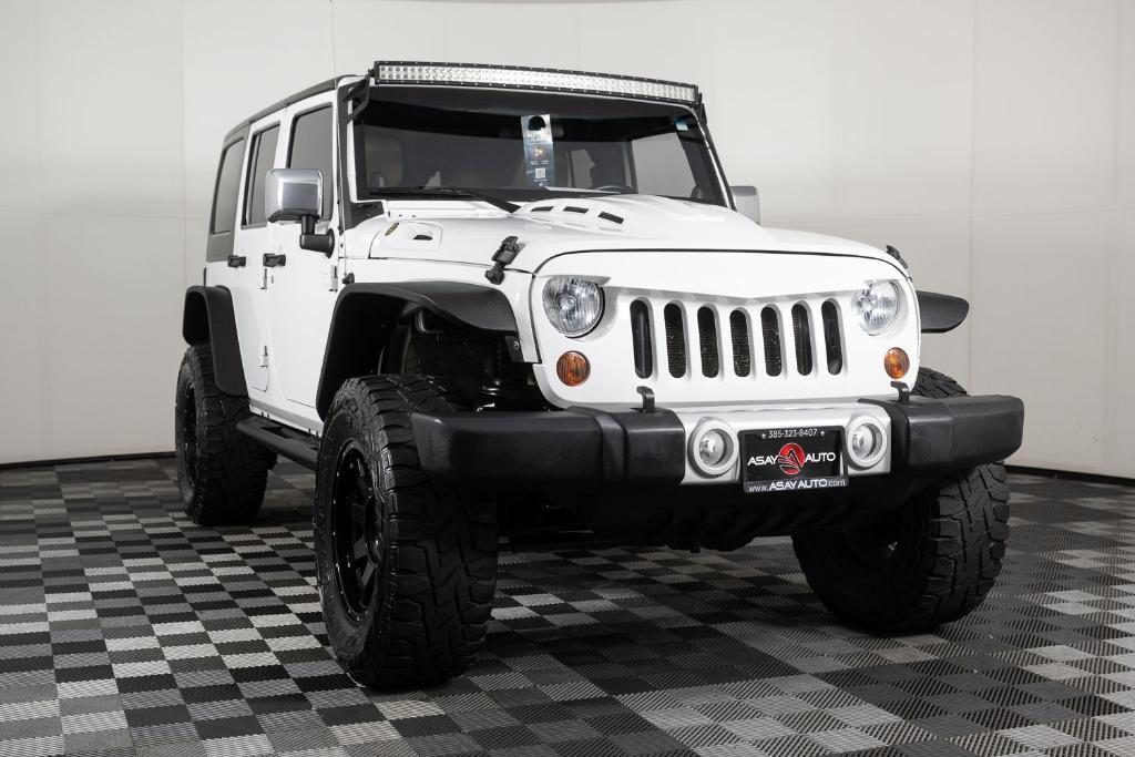 used 2011 Jeep Wrangler Unlimited car, priced at $15,995