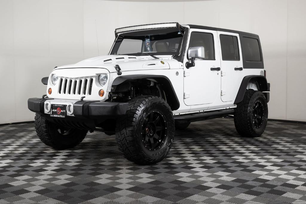 used 2011 Jeep Wrangler Unlimited car, priced at $15,495