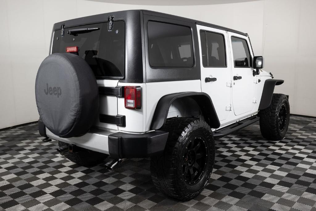 used 2011 Jeep Wrangler Unlimited car, priced at $15,995