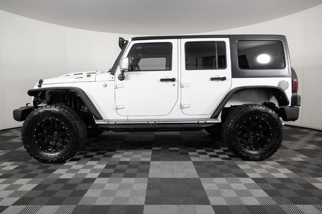 used 2011 Jeep Wrangler Unlimited car, priced at $15,995