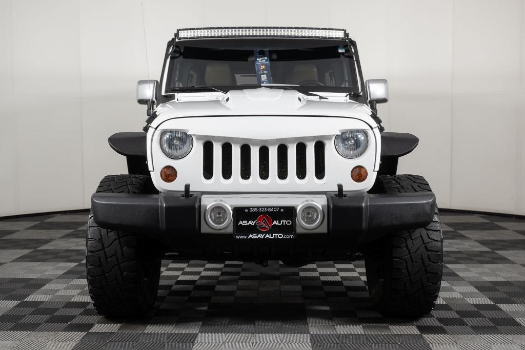 used 2011 Jeep Wrangler Unlimited car, priced at $15,995