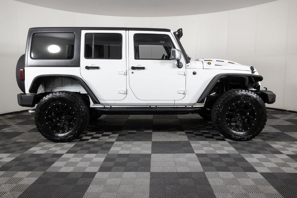 used 2011 Jeep Wrangler Unlimited car, priced at $15,995