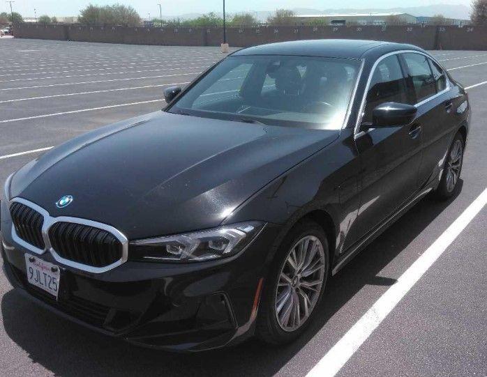 used 2024 BMW 330e car, priced at $31,600