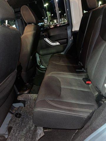 used 2014 Jeep Wrangler Unlimited car, priced at $15,300