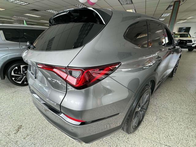 used 2025 Acura MDX car, priced at $57,997