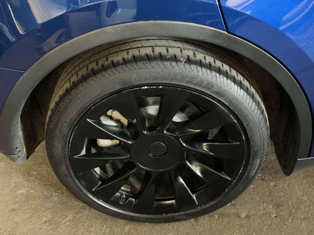 used 2021 Tesla Model Y car, priced at $27,947