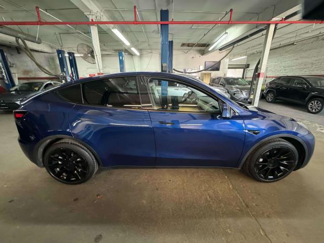 used 2021 Tesla Model Y car, priced at $28,197