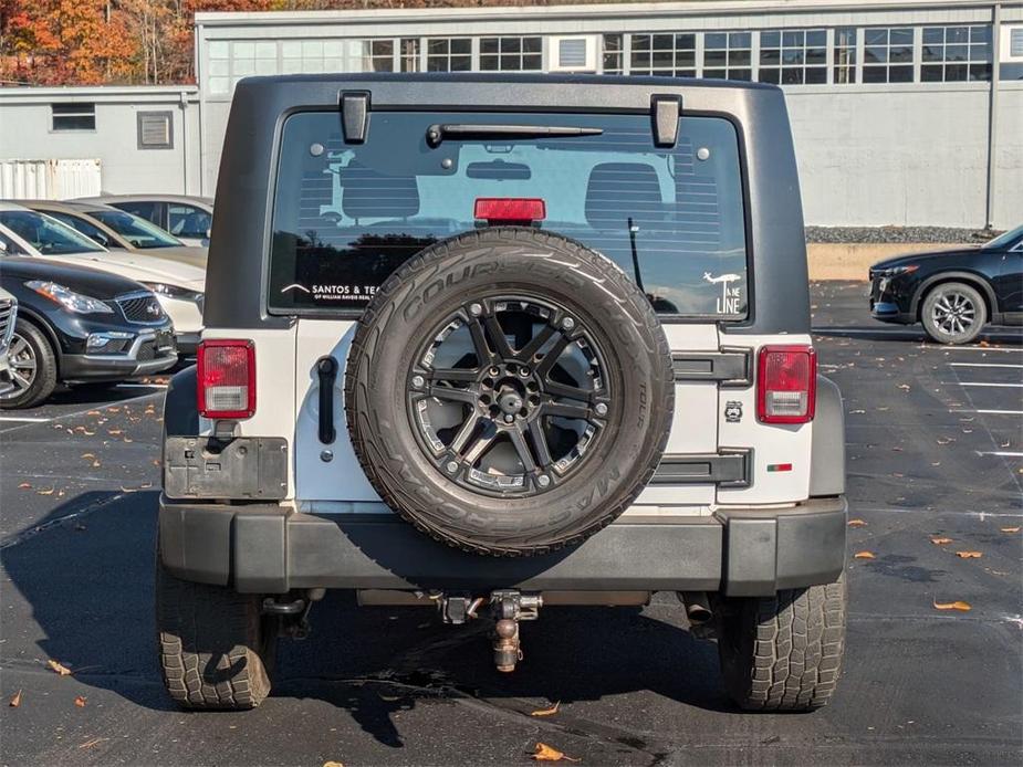 used 2014 Jeep Wrangler car, priced at $14,396