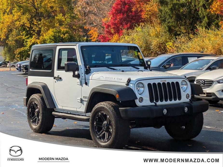 used 2014 Jeep Wrangler car, priced at $14,396