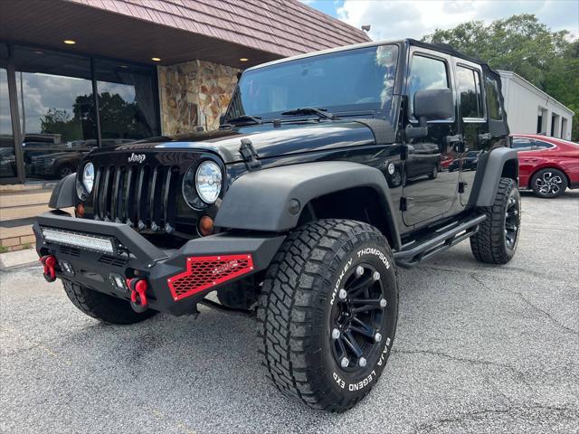 used 2013 Jeep Wrangler Unlimited car, priced at $16,998