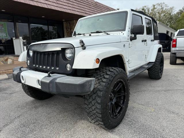 used 2016 Jeep Wrangler Unlimited car, priced at $19,998